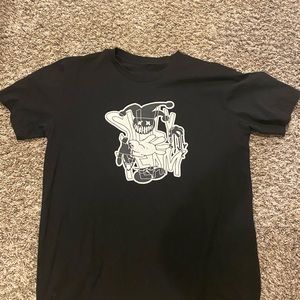 Used Black Silly Team tee!